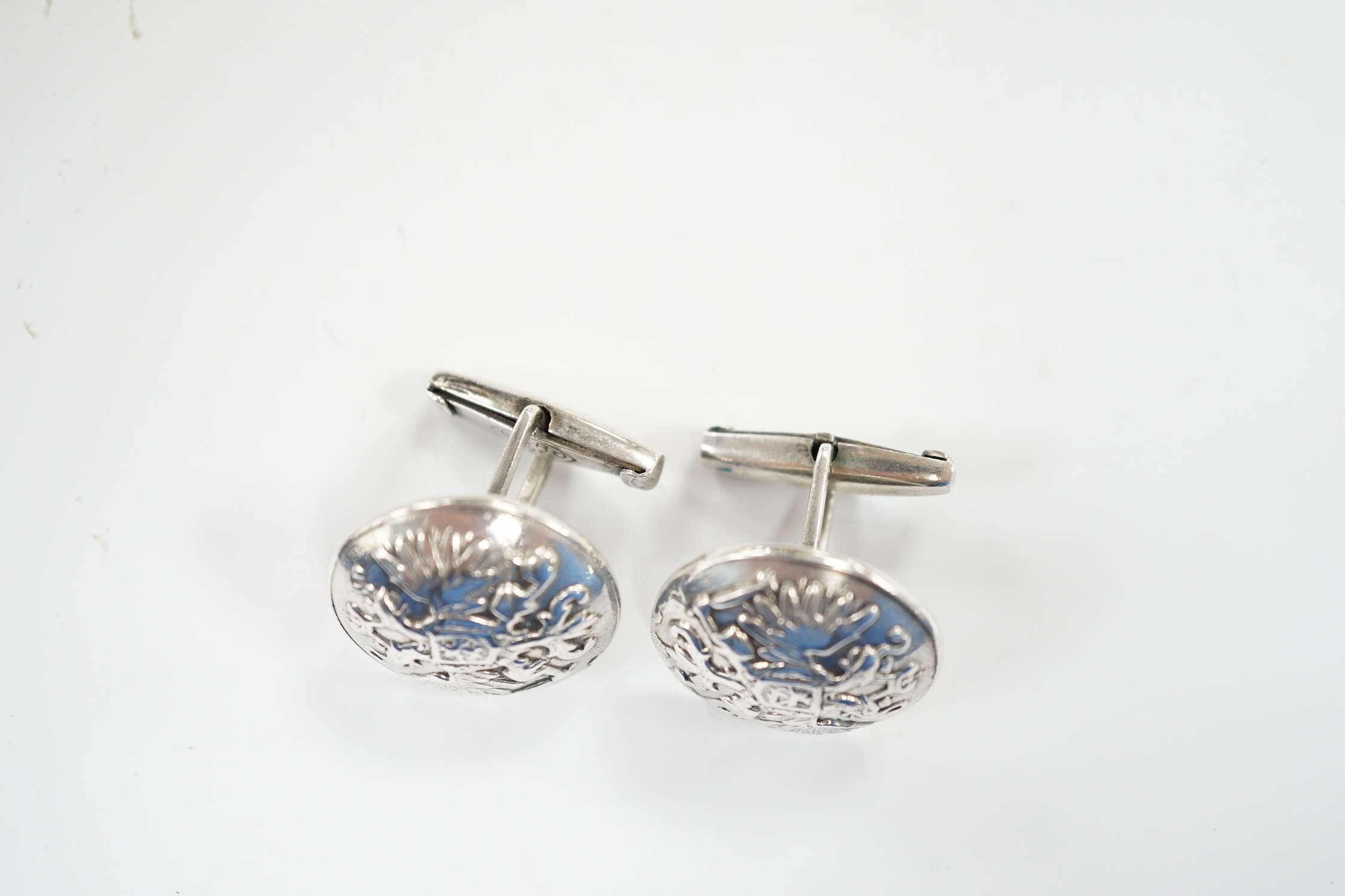 A pair of Russian 925 circular button cufflinks, embossed with the Coat of Arms of Russia, verso with maker in Cyrillic, St Petersburg, diameter 20mm.